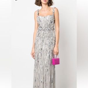 Brand new never worn Jenny Packham sequin silver dress. Price negotiable